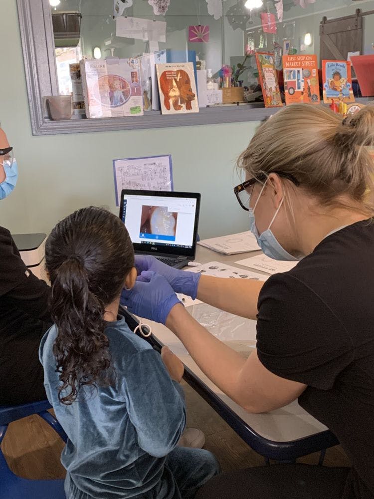Hygiene students gain plenty of experience with teledentistry both in the classroom and at community outreach programs where they work with children and conduct oral health screenings.