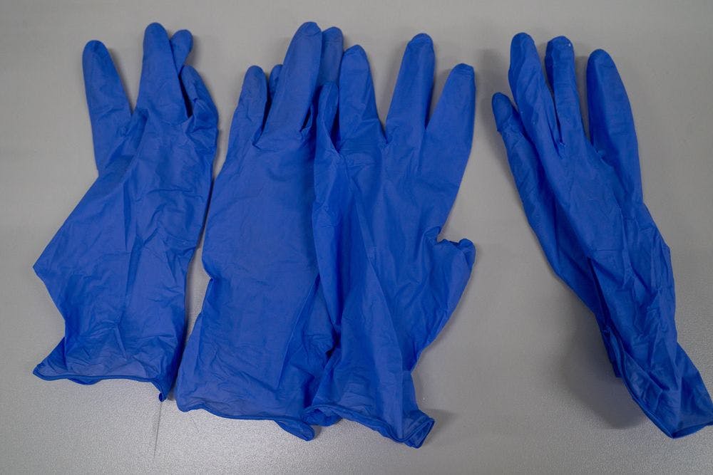 Millions of Used Medical Gloves Imported to the US. Photo courtesy of Panupat/stock.adobe.com.