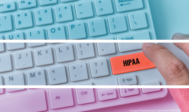 Computer keyboard with a red button labeled, "HIPAA"