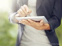 Image of a person using an iPad