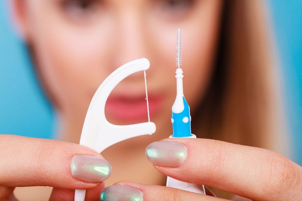 A Love Affair with Dental Floss: Is it Warranted? Photo courtesy of Voyagerix/stock.adobe.com. 