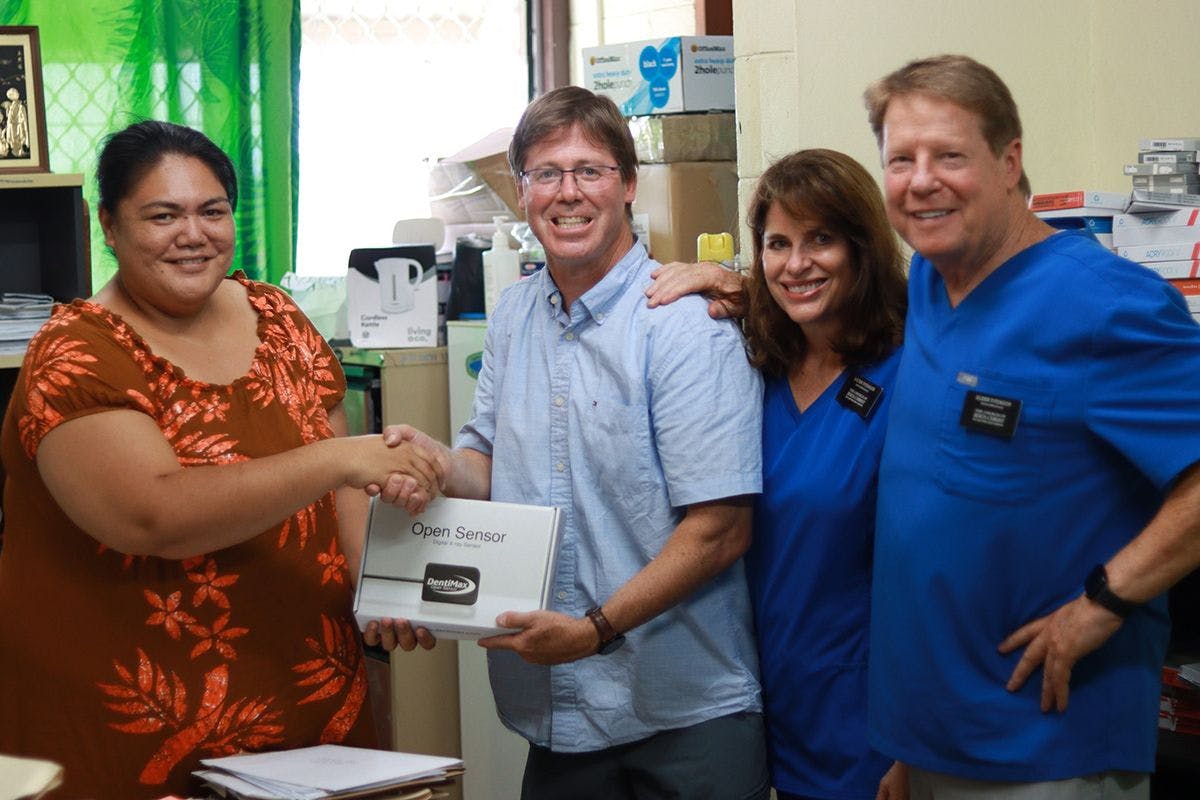 DentiMax President David Arnett (second from left) traveled to Samoa, where he donated dental equipment to the Samoan government and The Church of Jesus Christ of Latter-day Saints. | Image Credit: © DentiMax