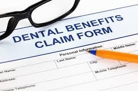 Dental membership program, tiered coverage, reimbursement, uninsured, treatment, deductible, subscription