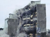 Image of a concrete building collapsing