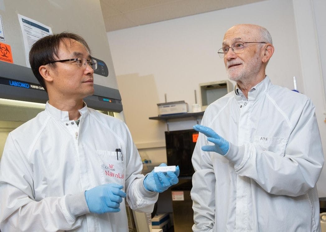 Senior Research Associate Daewoo Han, left, and Distinguished Research Professor Andrew Steckl collaborated on a new at-home test for gingivitis in Steckl's NanoLab. Photo/Andrew Higley/UC Marketing + Brand