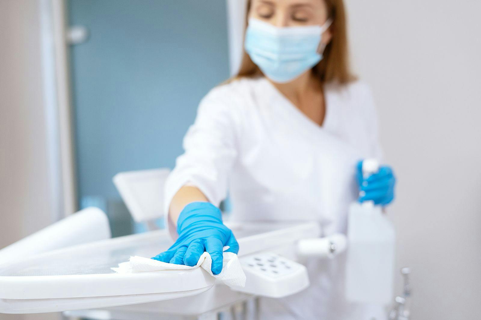 Cleaning a Dental Delivery System Between Patients - brizmaker / stock.adobe.com 474779147