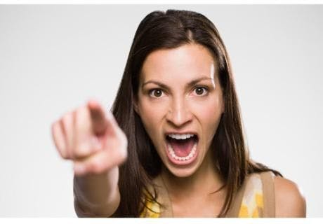 Image of a woman pointing and yelling
